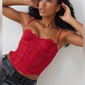 Urban Outfitters Out from Under Modern Love Lace Corset in red.